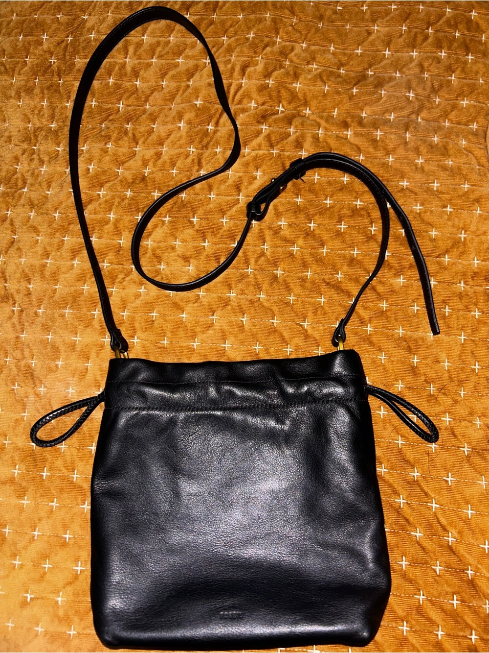 Black leather Fossil drawstring purse